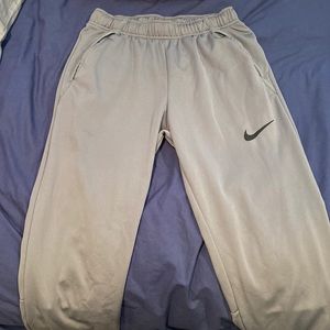 Nike sweatpants size small, runs a little bit bigger because length is longer